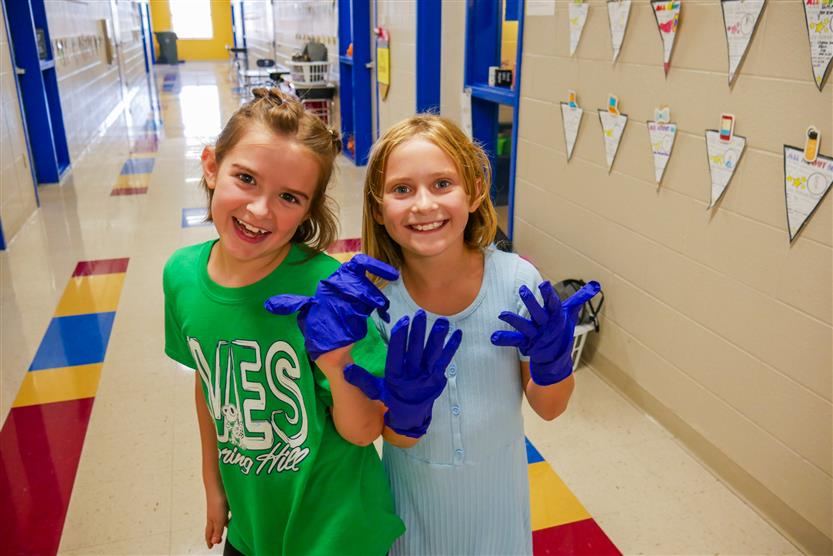 Students study earthworms in class
